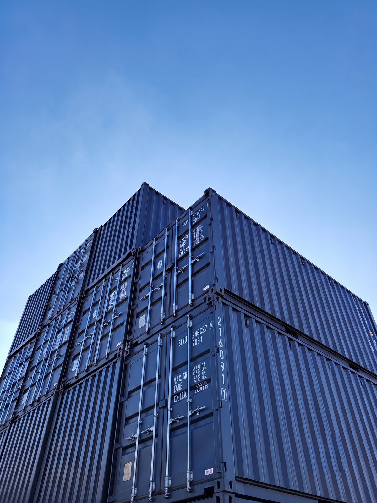Stacked shipping containers of goods from China